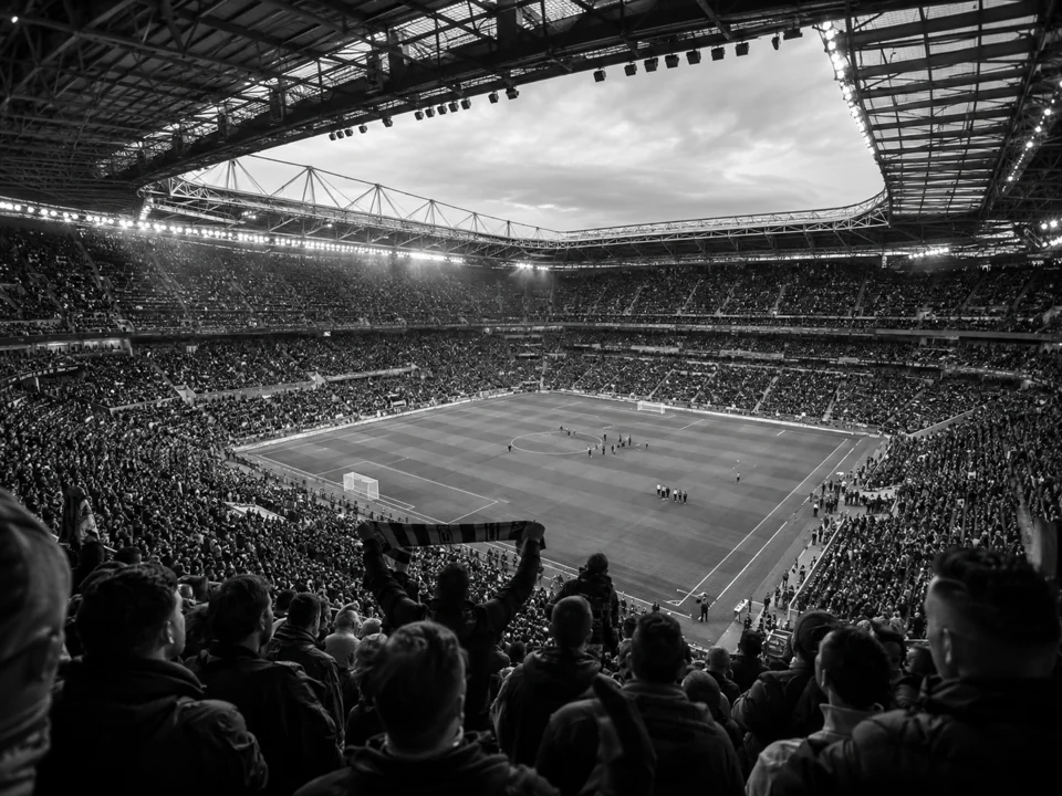A football stadium and pitch just before a live match.